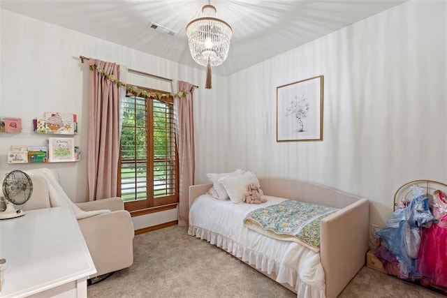 1900 Cobblestone Dr, Shawnee, OK 74804 - bedroom with carpet flooring and a chandelier