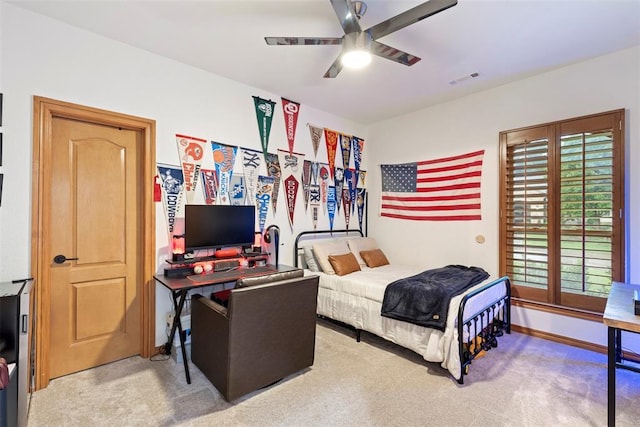 1900 Cobblestone Dr, Shawnee, OK 74804 - bedroom with carpet floors and a ceiling fan