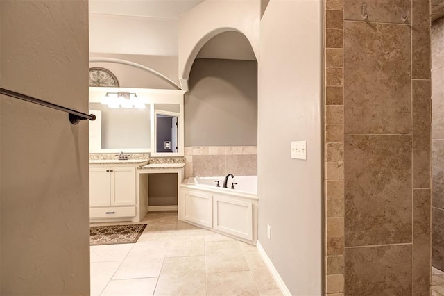 2329 Chase Way, Yukon, OK 73099 - bathroom featuring vanity, a bath, and tile patterned floors