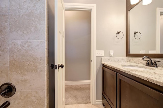 2329 Chase Way, Yukon, OK 73099 - bathroom with vanity and baseboards