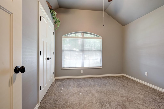 2329 Chase Way, Yukon, OK 73099 - spare room featuring carpet flooring and vaulted ceiling