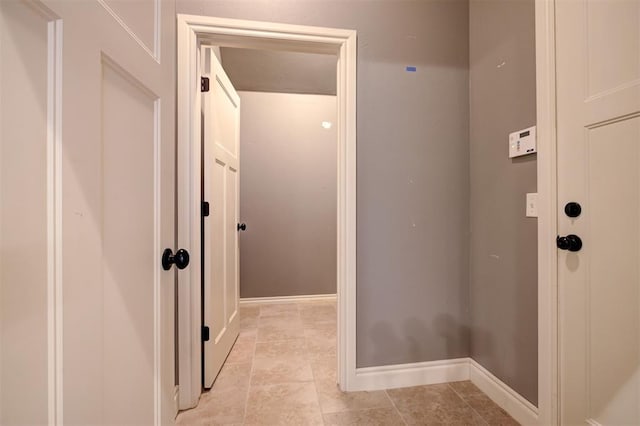 2329 Chase Way, Yukon, OK 73099 - hallway featuring baseboards and light tile patterned flooring