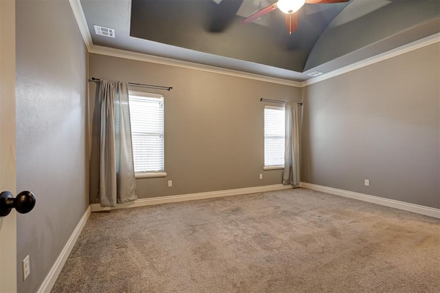 2329 Chase Way, Yukon, OK 73099 - carpeted empty room featuring ceiling fan, vaulted ceiling, and ornamental molding