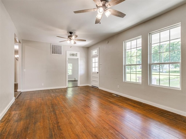529 S 2nd Ave, Purcell, OK 73080 - empty room with ceiling fan and dark wood-style floors