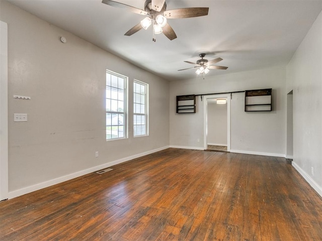 529 S 2nd Ave, Purcell, OK 73080 - spare room with a ceiling fan and hardwood / wood-style floors