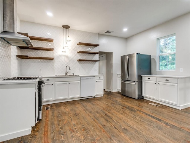 529 S 2nd Ave, Purcell, OK 73080 - kitchen with stainless steel appliances, open shelves, extractor fan, and white cabinets