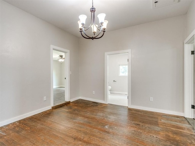 529 S 2nd Ave, Purcell, OK 73080 - spare room featuring a chandelier and wood finished floors