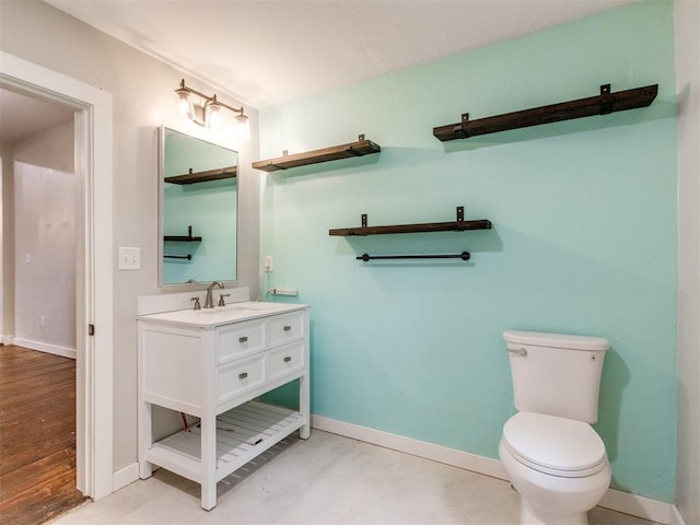 529 S 2nd Ave, Purcell, OK 73080 - bathroom featuring vanity and baseboards