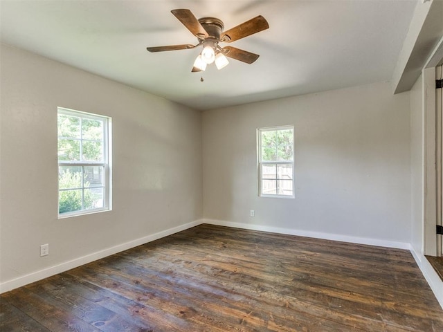 529 S 2nd Ave, Purcell, OK 73080 - unfurnished room with plenty of natural light, dark wood-style flooring, and a ceiling fan