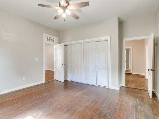 529 S 2nd Ave, Purcell, OK 73080 - unfurnished bedroom with wood-type flooring, a closet, and ceiling fan