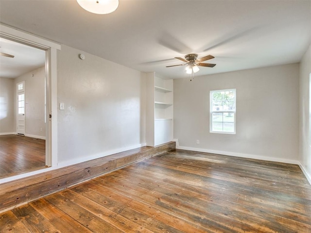 529 S 2nd Ave, Purcell, OK 73080 - spare room featuring ceiling fan and hardwood / wood-style floors