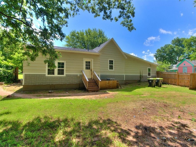 529 S 2nd Ave, Purcell, OK 73080 - rear view of house featuring entry steps and crawl space