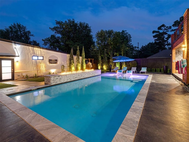 2824 Guilford Ln, Oklahoma City, OK 73120 - view of pool with a patio area and a fenced backyard