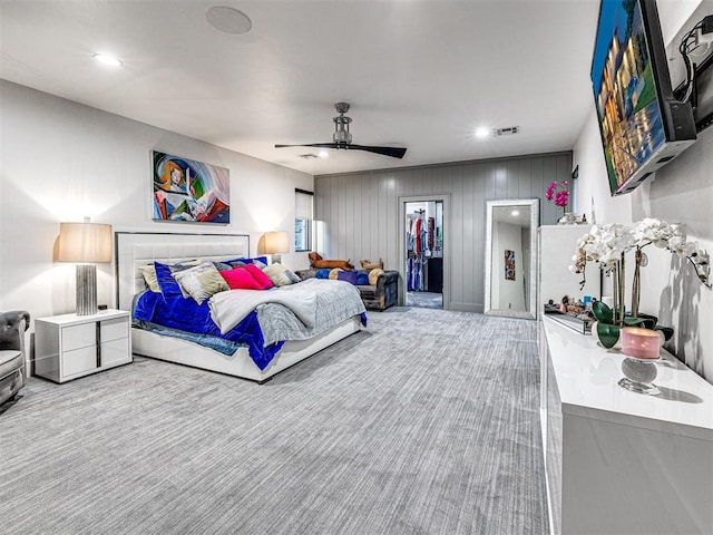 2824 Guilford Ln, Oklahoma City, OK 73120 - carpeted bedroom featuring a walk in closet, ceiling fan, a closet, and recessed lighting