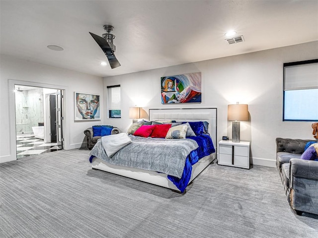 2824 Guilford Ln, Oklahoma City, OK 73120 - carpeted bedroom featuring a ceiling fan and connected bathroom