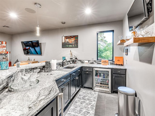 2824 Guilford Ln, Oklahoma City, OK 73120 - indoor wet bar featuring wine cooler, pendant lighting, and recessed lighting