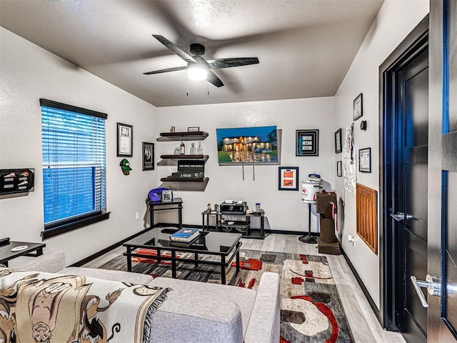 2824 Guilford Ln, Oklahoma City, OK 73120 - living room with wood finished floors and a ceiling fan