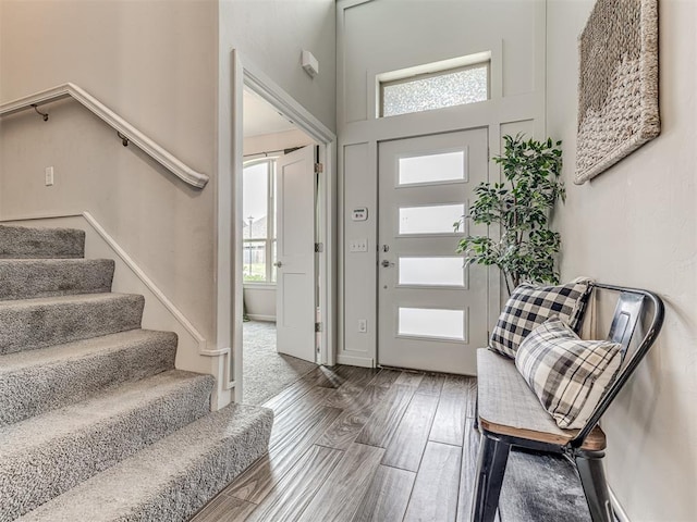 11104 Fairways Ave, Yukon, OK 73099 - foyer with healthy amount of natural light, stairway, and wood finished floors
