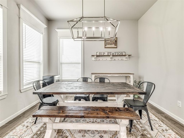 11104 Fairways Ave, Yukon, OK 73099 - dining room with plenty of natural light, a chandelier, and wood finished floors