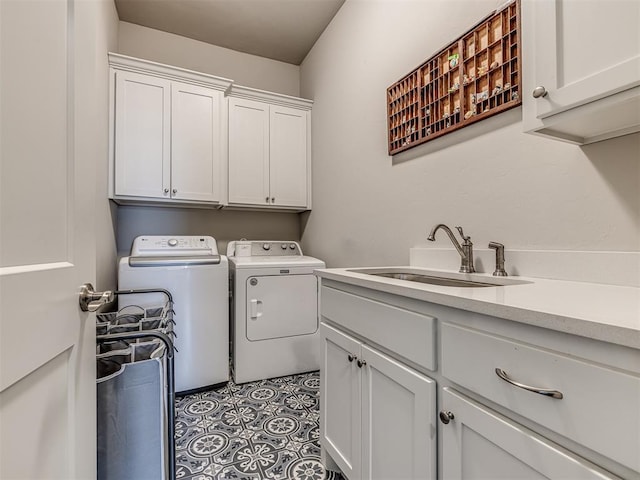11104 Fairways Ave, Yukon, OK 73099 - laundry area with cabinet space and separate washer and dryer