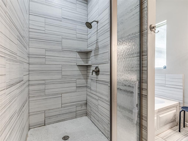 11104 Fairways Ave, Yukon, OK 73099 - bathroom featuring a shower stall, a bath, and tile patterned floors