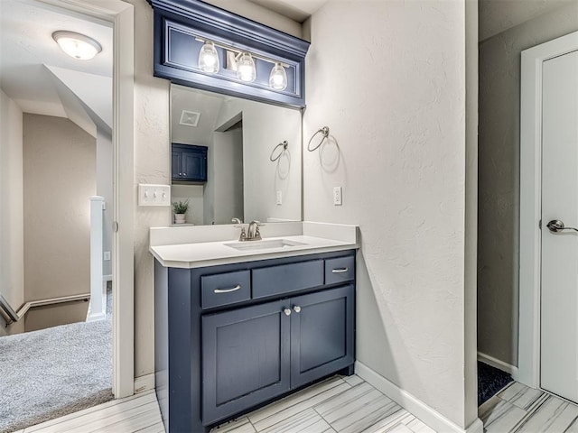 11104 Fairways Ave, Yukon, OK 73099 - bathroom featuring vanity and a textured wall