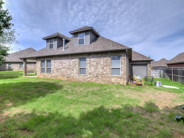 11104 Fairways Ave, Yukon, OK 73099 - rear view of house with brick siding, a garage, and a shingled roof
