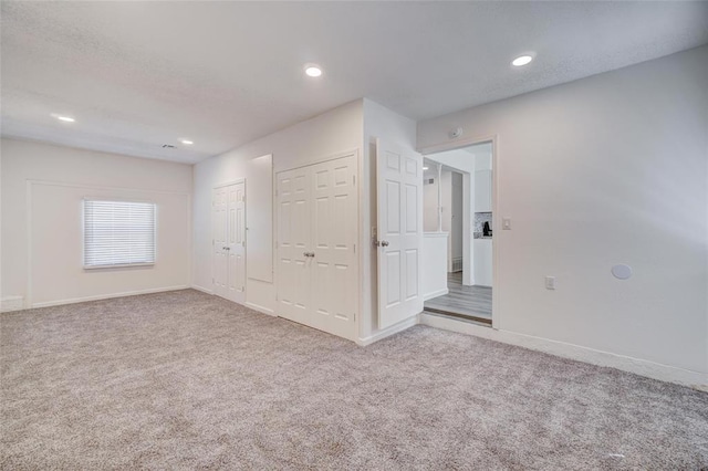1409 Mcdonald Dr, Midwest City, OK 73130 - carpeted spare room with recessed lighting