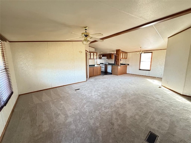 35440 Ew 1410th Rd, Konawa, OK 74849 - unfurnished living room featuring ceiling fan, light colored carpet, and a textured wall