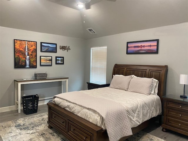 5557 Coker Rd, Shawnee, OK 74804 - bedroom featuring wood finished floors, vaulted ceiling, and ceiling fan