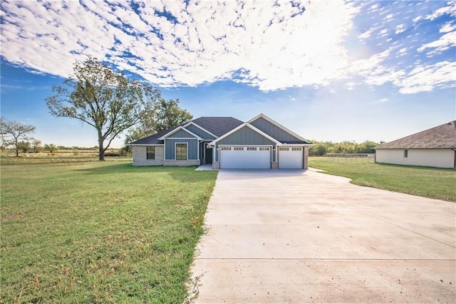 5557 Coker Rd, Shawnee, OK 74804 - craftsman-style house featuring driveway, a garage, and board and batten siding
