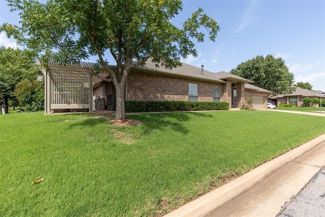 1800 NW 161st Pl, Edmond, OK 73013 - view of front of house with a garage, a front yard, brick siding, and concrete driveway
