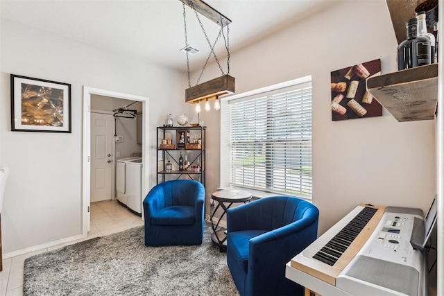 1800 NW 161st Pl, Edmond, OK 73013 - sitting room featuring washing machine and dryer and tile patterned floors