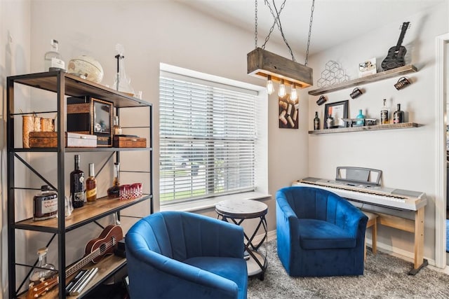 1800 NW 161st Pl, Edmond, OK 73013 - living area with plenty of natural light and carpet flooring