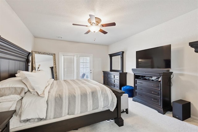 1800 NW 161st Pl, Edmond, OK 73013 - bedroom featuring light colored carpet and a ceiling fan