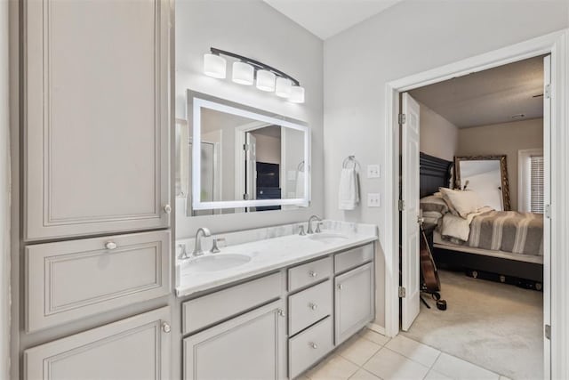 1800 NW 161st Pl, Edmond, OK 73013 - full bath with ensuite bath, double vanity, and tile patterned floors