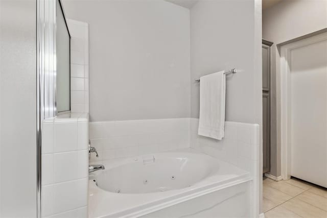 1800 NW 161st Pl, Edmond, OK 73013 - full bathroom with a tub with jets and tile patterned flooring
