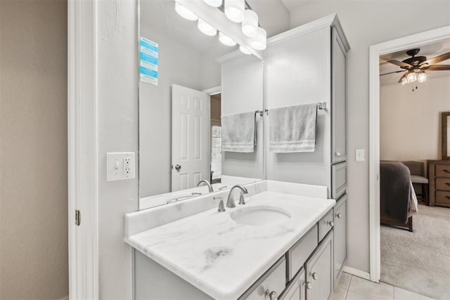 1800 NW 161st Pl, Edmond, OK 73013 - ensuite bathroom with vanity, a ceiling fan, and tile patterned floors