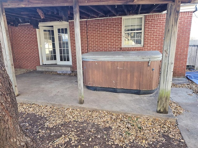 1137 Mallard Dr, Del City, OK 73115 - view of patio featuring a hot tub