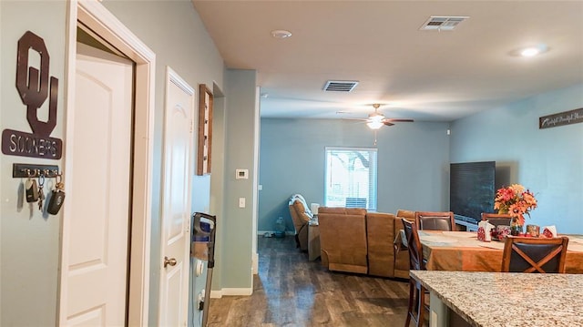 1016 NW 4th St, Newcastle, OK 73065 - dining area with dark wood-style flooring and ceiling fan