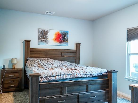 1016 NW 4th St, Newcastle, OK 73065 - carpeted bedroom with baseboards