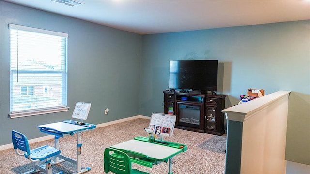 1016 NW 4th St, Newcastle, OK 73065 - playroom with healthy amount of natural light and carpet