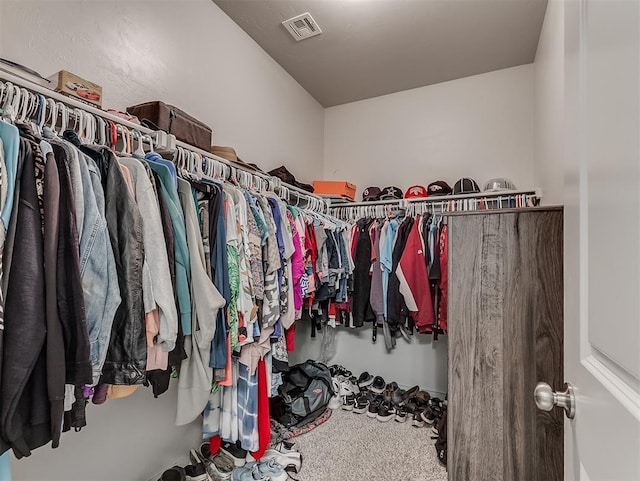 14325 Meadow Ridge Ln, Edmond, OK 73025 - walk in closet featuring carpet floors