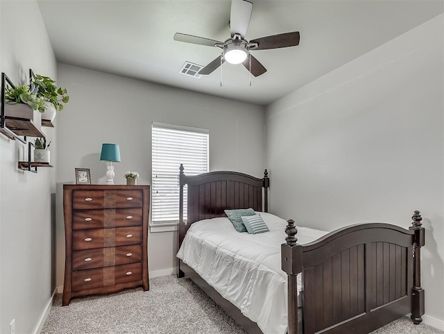 14325 Meadow Ridge Ln, Edmond, OK 73025 - bedroom with carpet flooring and ceiling fan