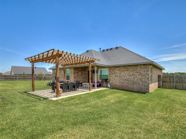 14325 Meadow Ridge Ln, Edmond, OK 73025 - rear view of house with a pergola, a fenced backyard, a patio, and brick siding