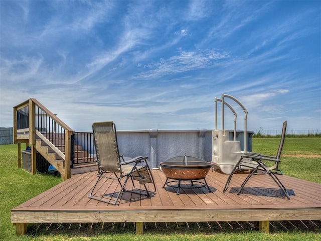 14325 Meadow Ridge Ln, Edmond, OK 73025 - deck with an outdoor fire pit, stairs, and a lawn