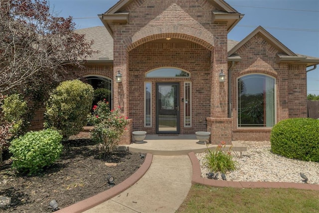 4501 NW 164th Ter, Edmond, OK 73013 - entrance to property with brick siding and a shingled roof