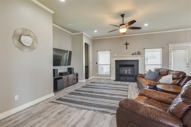 4501 NW 164th Ter, Edmond, OK 73013 - living area with plenty of natural light, light wood-style floors, a ceiling fan, recessed lighting, and arched walkways