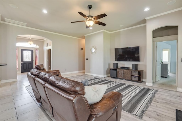 4501 NW 164th Ter, Edmond, OK 73013 - living room featuring arched walkways, ceiling fan, ornamental molding, and recessed lighting