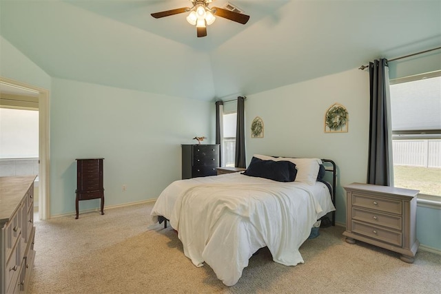 4501 NW 164th Ter, Edmond, OK 73013 - bedroom featuring light carpet, a ceiling fan, and lofted ceiling